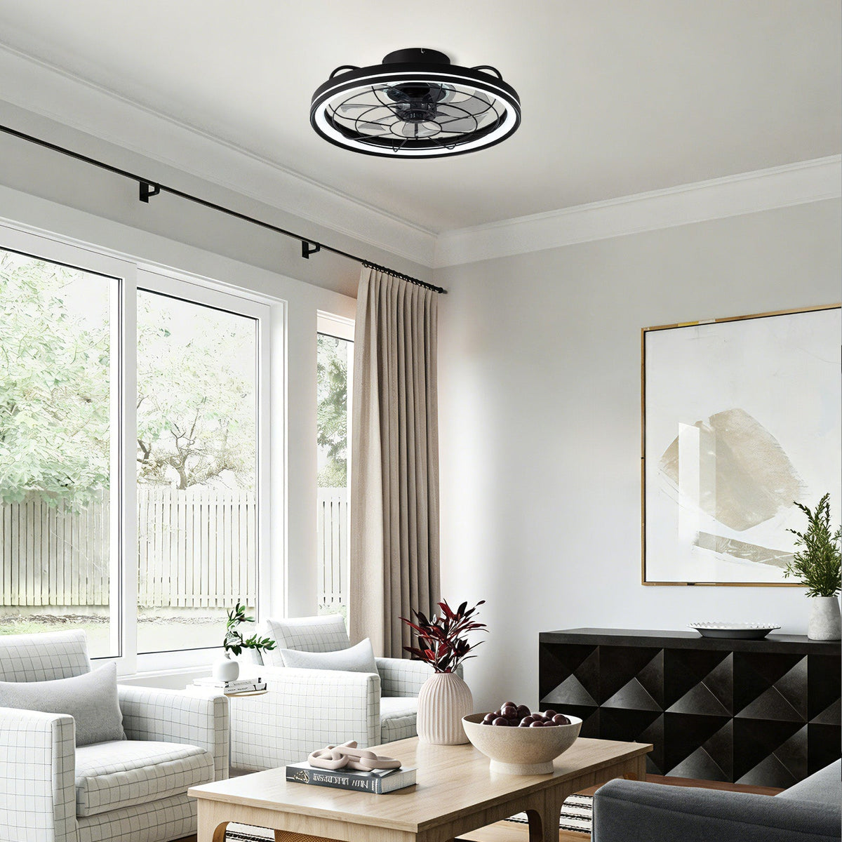 Aerox Black Caged Fan in bright living room — white sofa, geometric wall art, natural light, stylish air circulation, compatible with smart home systems | CARRA HOME