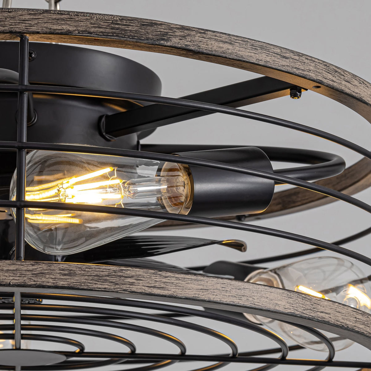 Aerux close-up detail — light blue metal cage, vintage Edison filament bulbs, wooden grain accent ring, color-changing LED, blend of farmhouse charm and industrial craftsmanship | CARRA HOME