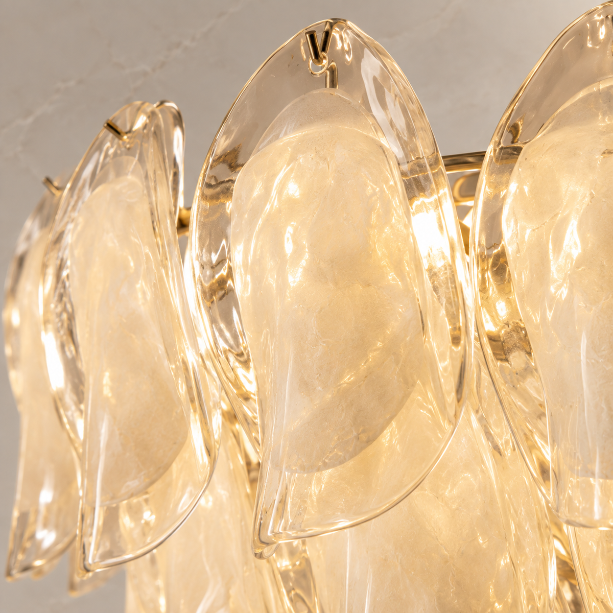Close-up of Altavilla textured glass petal and gold-tone frame | CARRA HOME