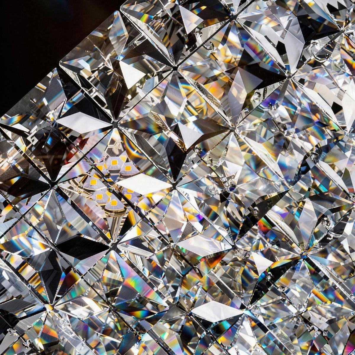 Closeup of Aria Modern Gold K9 Crystal Glacier Irregular Three-Color Dimming Chandelier — showcasing intricate faceted crystal cuts, rainbow light refraction, and premium craftsmanship for maximum sparkle | Carra Home