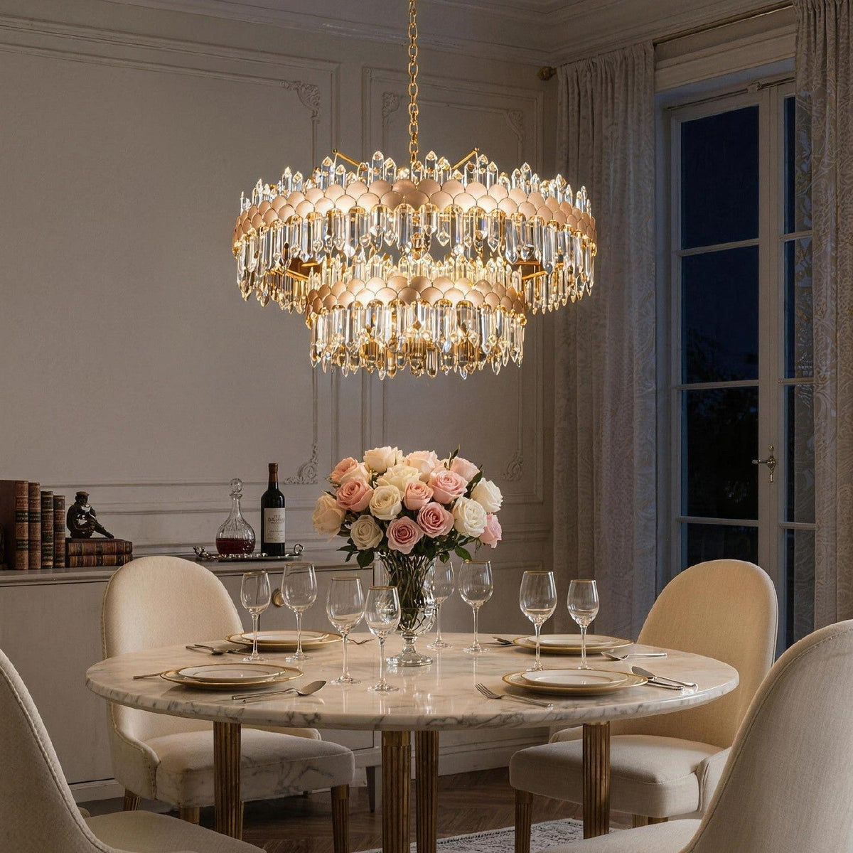 aurelio modern gold k9 crystal double tiered three color dimming chandelier creating warm ambient lighting in modern dining room | Carra Home
