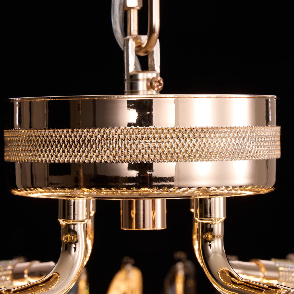 Extreme close-up of Aureme’s faceted crystal glass — iridescent light refraction, diamond-cut surfaces, and intricate gold lattice detailing | Carra Home