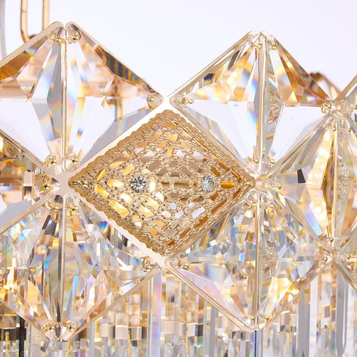 Aureme Chandelier suspension system — adjustable chain, gold-plated hardware, and seamless integration with pleated glass tiers | Carra Home