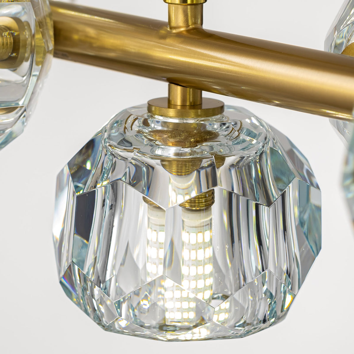 aurielle-contemporary-gold-crystal-linear-multi-head-chandelier-details-of-lights-CH618-A-Carra Home-20260427