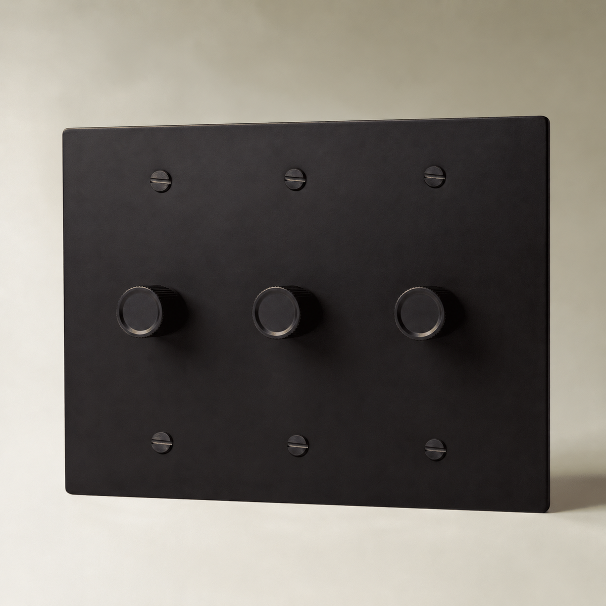 Brass Rotary Dimmer Switch, Night Black 3 Gang product view — seamless faceplate | CARRA HOME