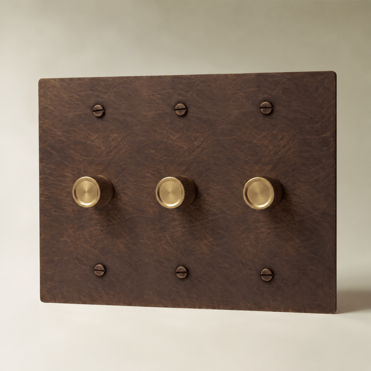 Brass Rotary Dimmer Switch, Vintage Brass with Patina 3 Gang product view — seamless faceplate | CARRA HOME