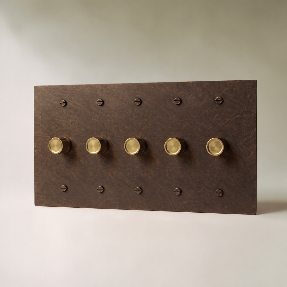 Brass Rotary Dimmer Switch, Vintage Brass with Patina 5 Gang product view — seamless faceplate | CARRA HOME