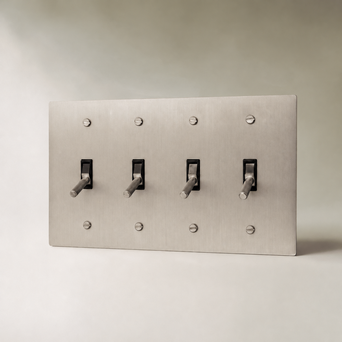 Brass Toggle Switch, Stainless Steel 4 Gang product view — seamless faceplate | CARRA HOME