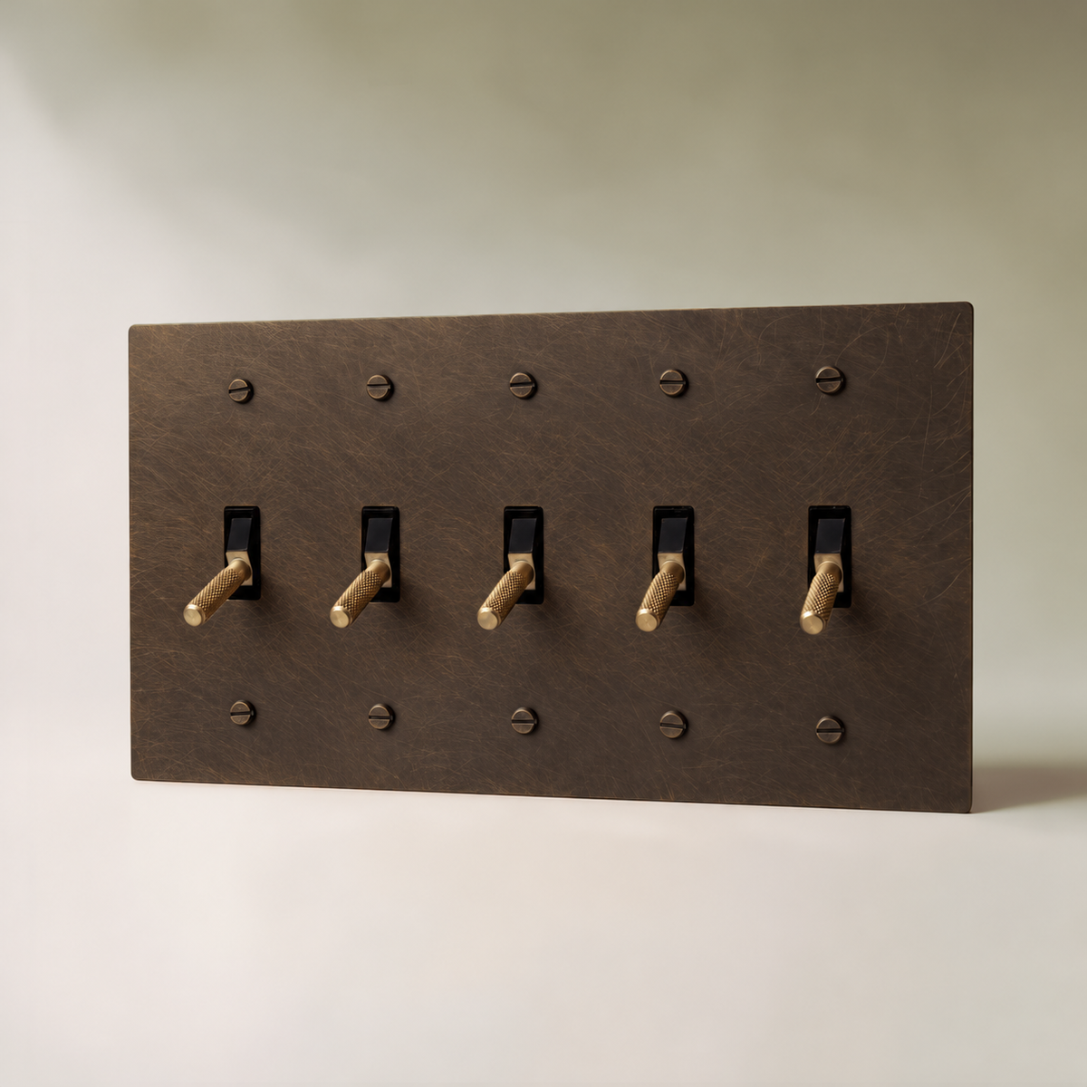 Brass Toggle Switch, Vintage Brass with Patina 5 Gang product view — seamless faceplate | CARRA HOME