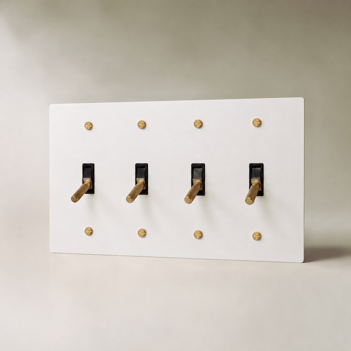 Brass Toggle Switch, White with Brass 4 Gang product view — seamless faceplate | CARRA HOME