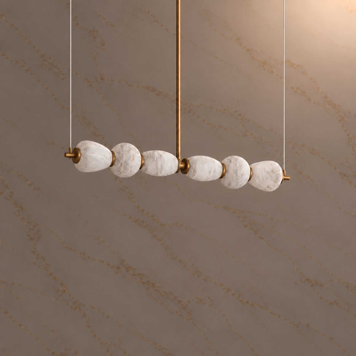Cairn Alabaster Pebble Linear Chandelier gold 135cm, light off | CARRA HOME