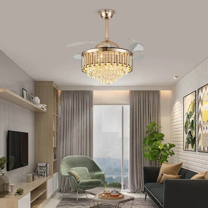 Crownelle Luxury K9 Crystal Retractable Ceiling Fan Chandelier in a contemporary living room — positioned above a seating area with a large window, offering both illumination and air circulation