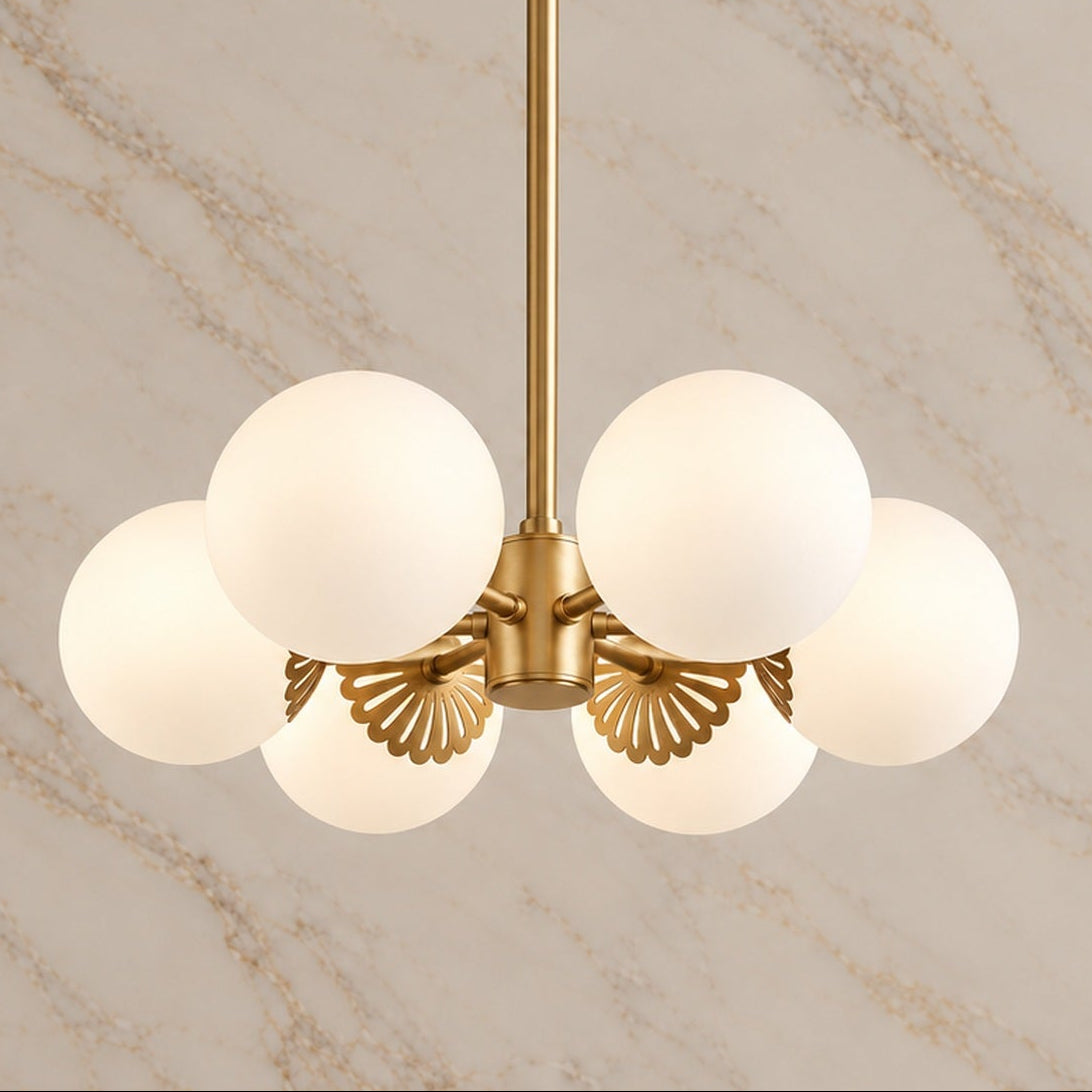 Dewdrop opal glass globe chandelier in gold with six lights switched on | CARRA HOME