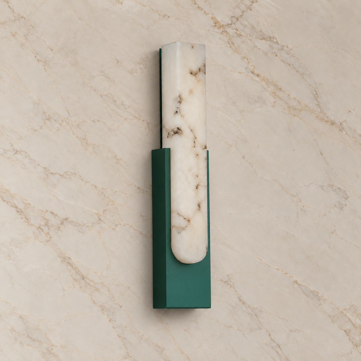 Emilia Alabaster Wall Sconce with green metalwork, switched off on a marble wall | CARRA HOME