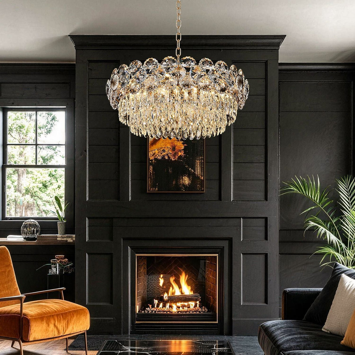 Glacia Modern Luxury Staggered K9 Crystal Flush Mount Chandelier in a living room — hanging above a beige tufted sofa with decorative pillows, against a dark paneled wall with artwork | Carra Home