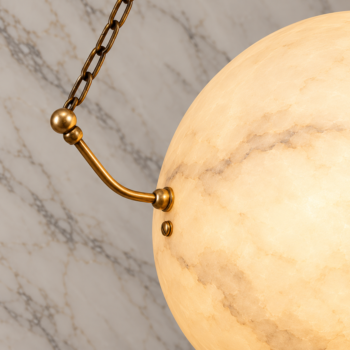 Globus Alabaster Globe Pendant Light copper alabaster body and side arm detail | CARRA HOME