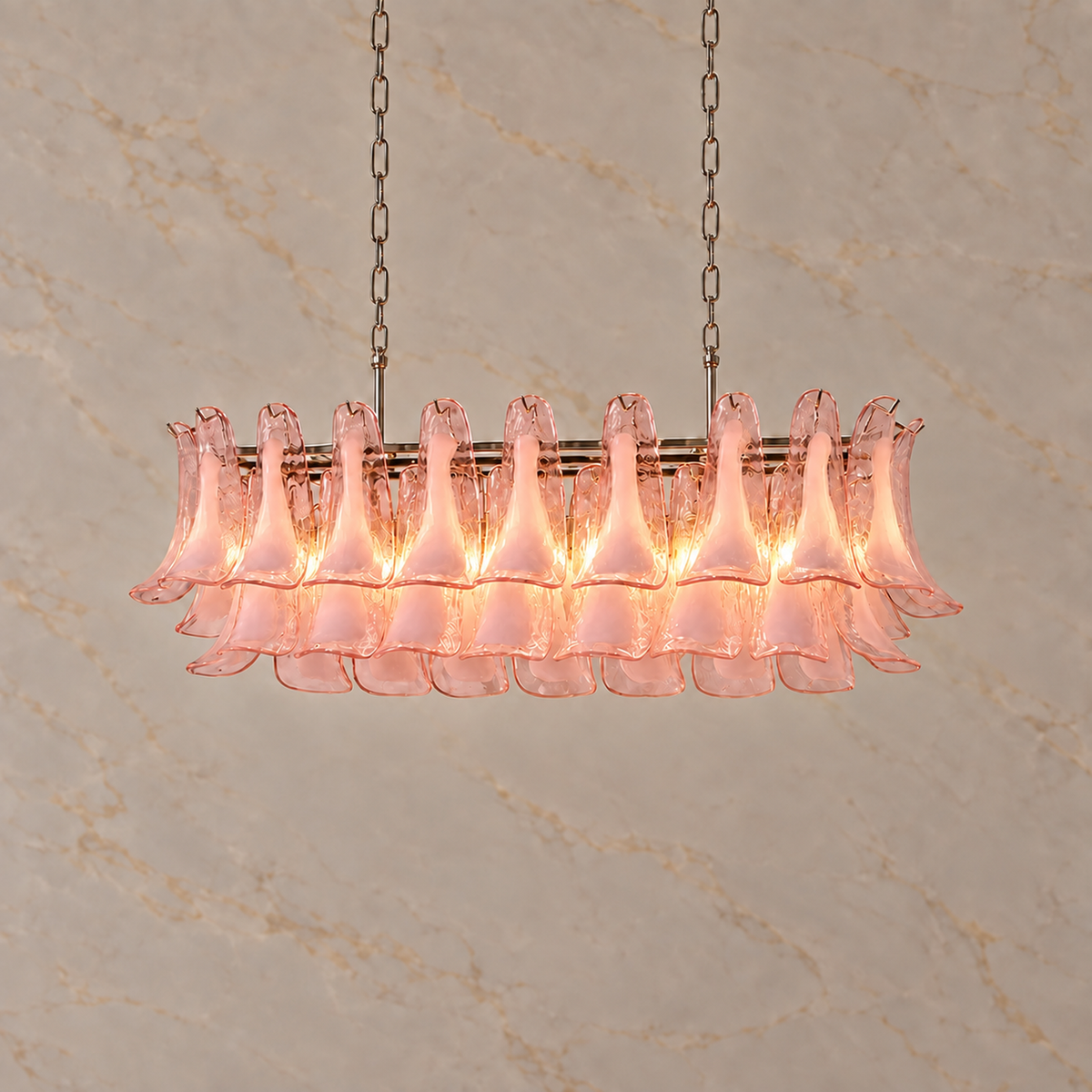 Liora pink glass petal linear chandelier, illuminated | CARRA HOME