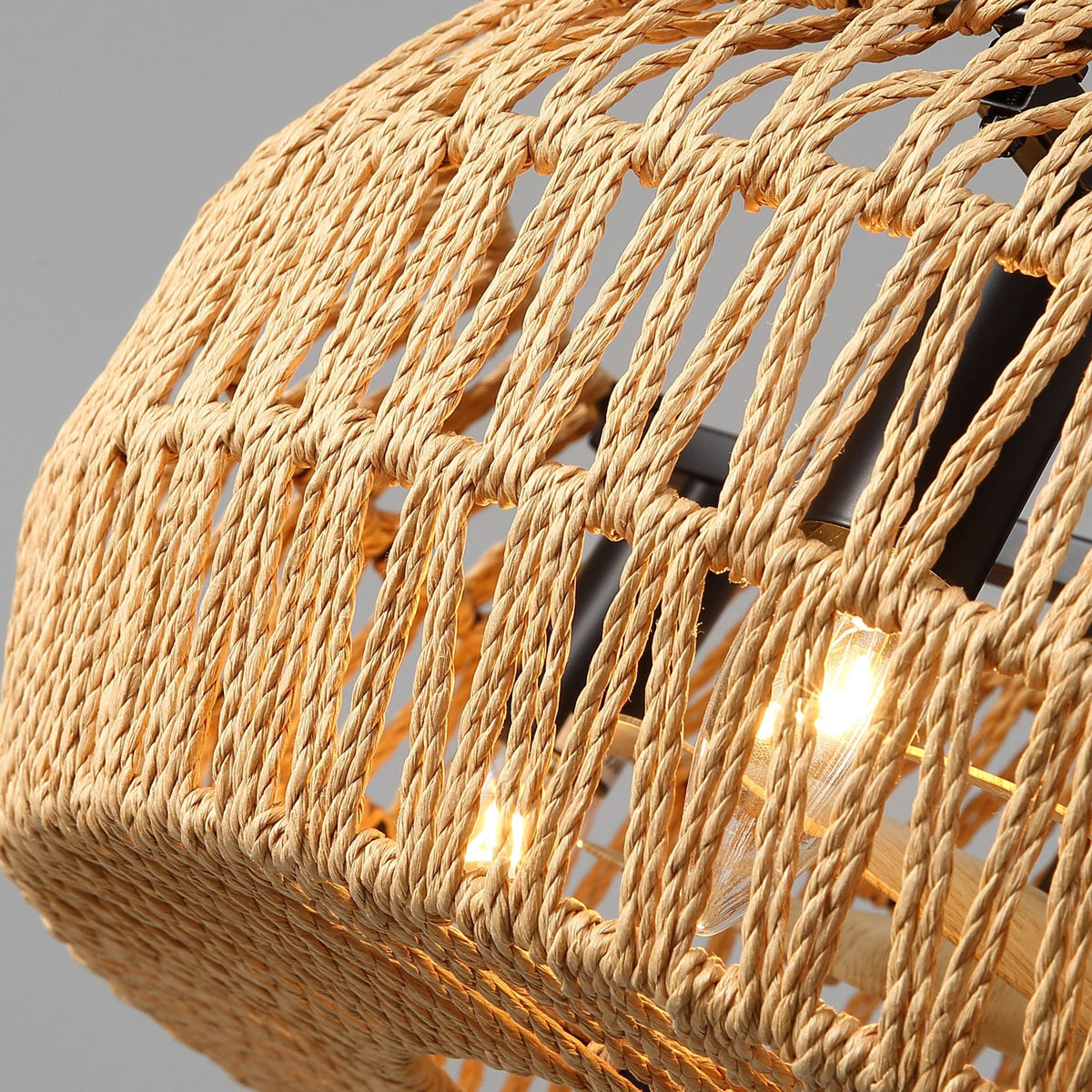 Close-up of Haven’s hand-woven rattan cage — intricate natural rope texture, durable boho craftsmanship, soft light diffusion | CARRA HOME