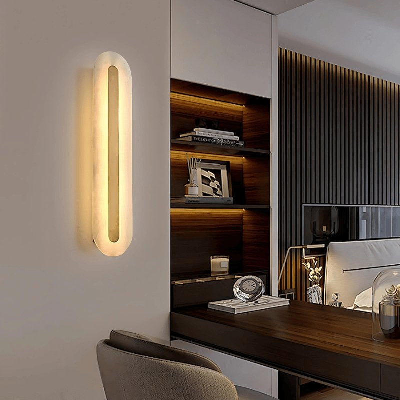 Lofos alabaster wall sconce on an interior feature wall | CARRA HOME