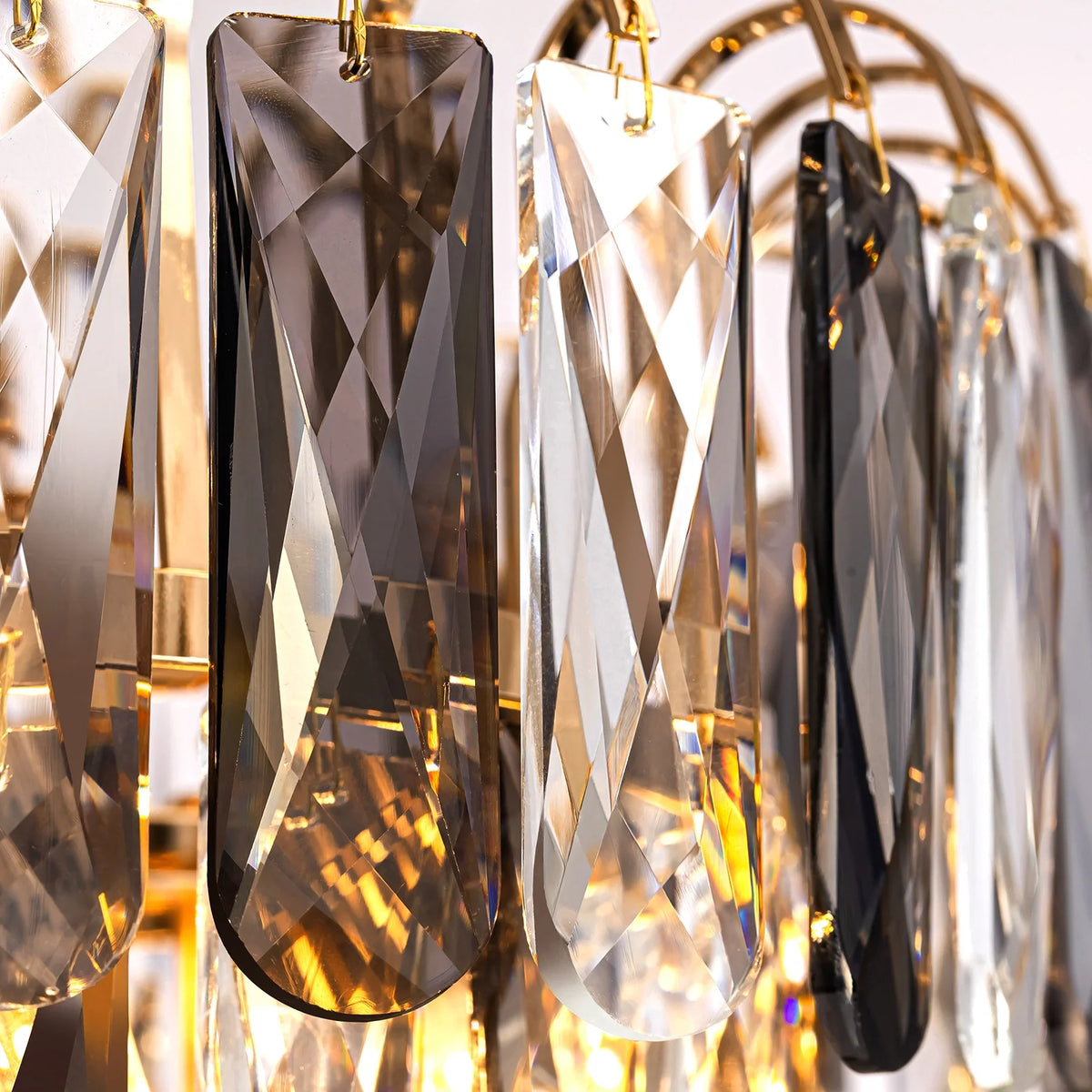 close-up-of-luxury-gold-crystal-tiered-chandelier-Carra Home-lighting