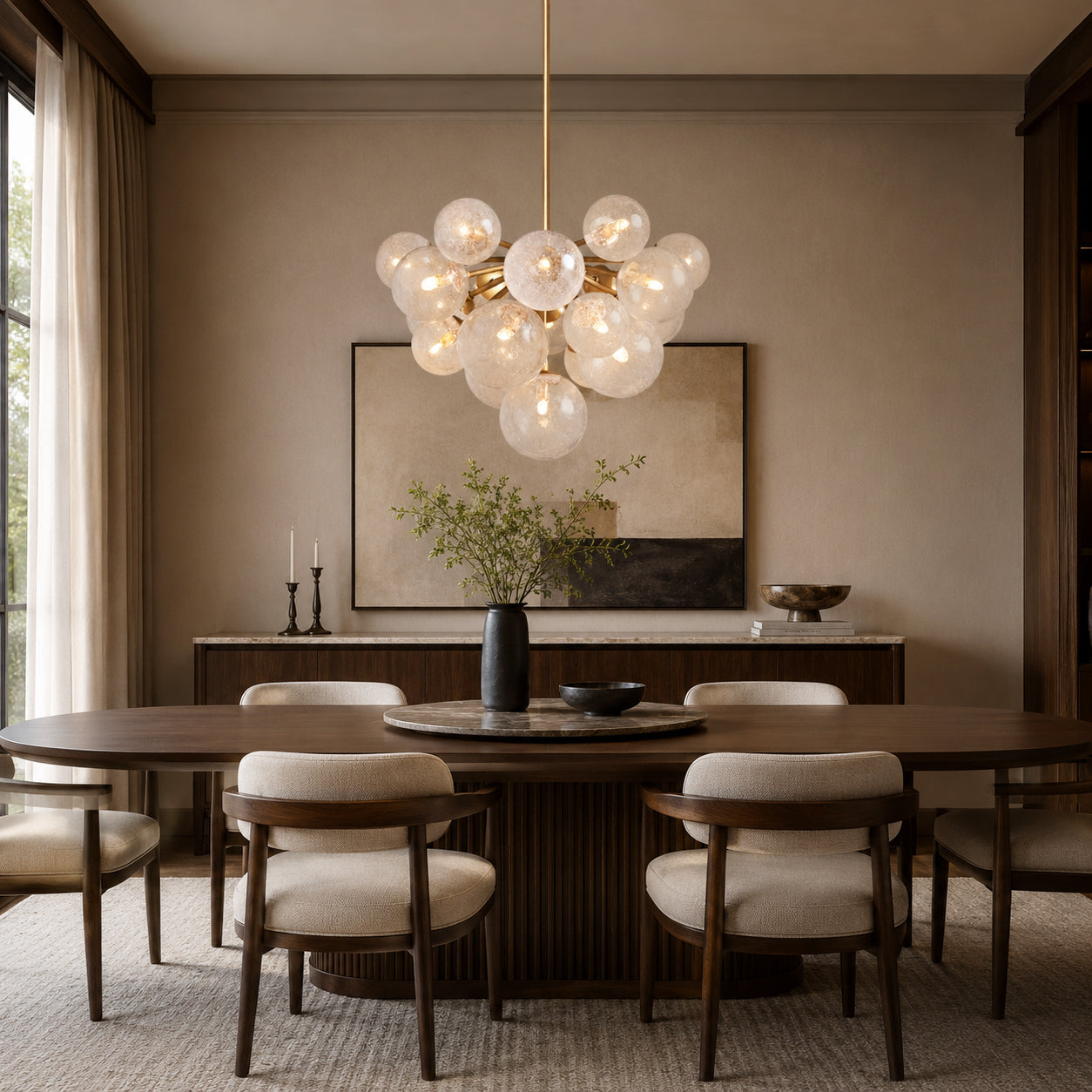 mandoza-glass-unique-chandelier-over-dining-table-carra-home