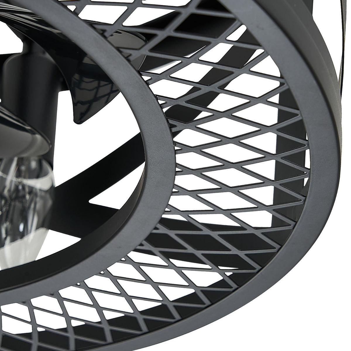 Close-up of caged ceiling fan mesh grille — diamond lattice metalwork, matte black finish, protective enclosure detail | CARRA HOME