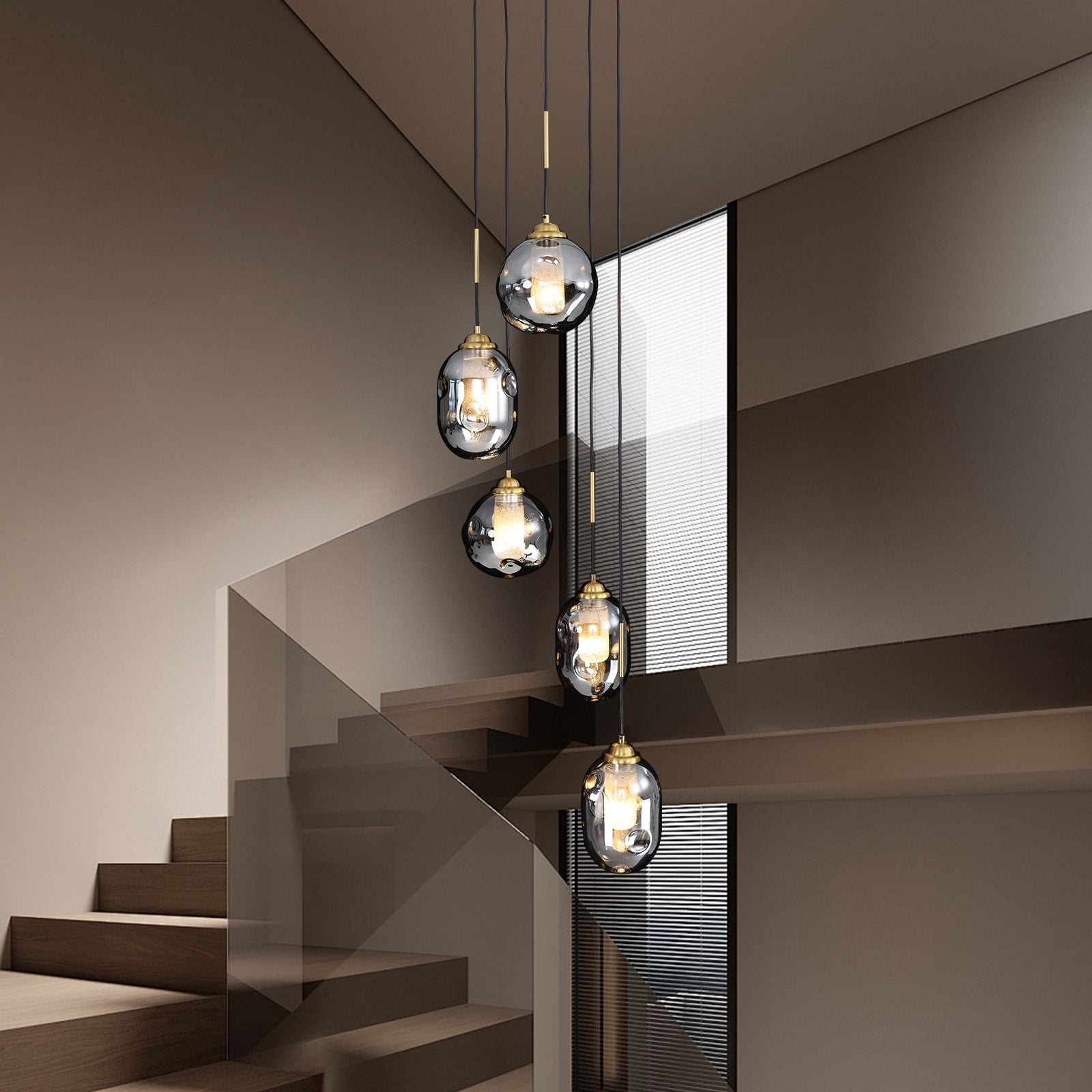 Nova Lava Glass Cascading Chandelier in a sophisticated staircase — dark wood steps, glass balustrade, and modern art, emphasizing the chandelier’s artistic form