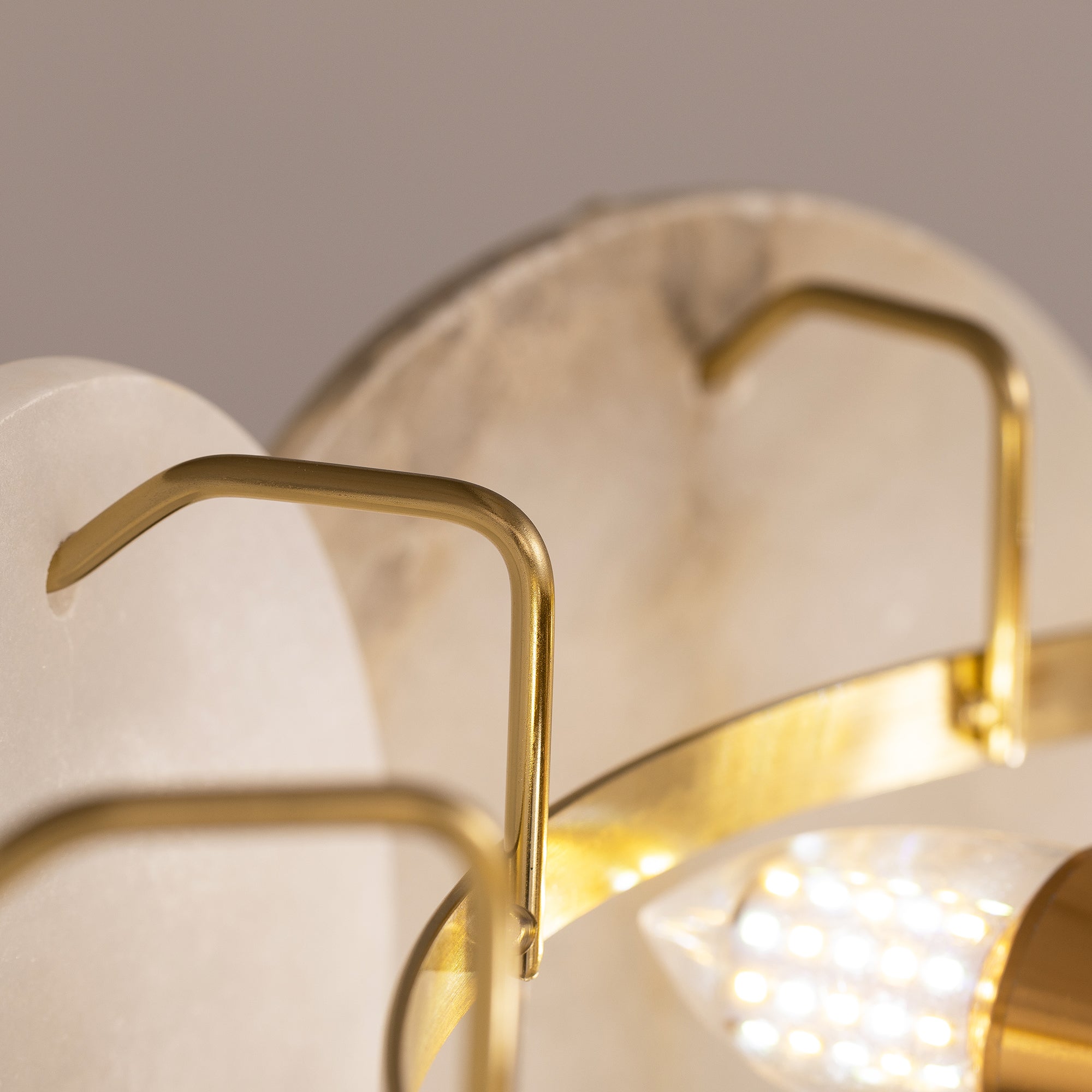 orlisse-modern-luxury-brass-alabaster-double-tier-disc-chandelier-shelf-details-carra-home