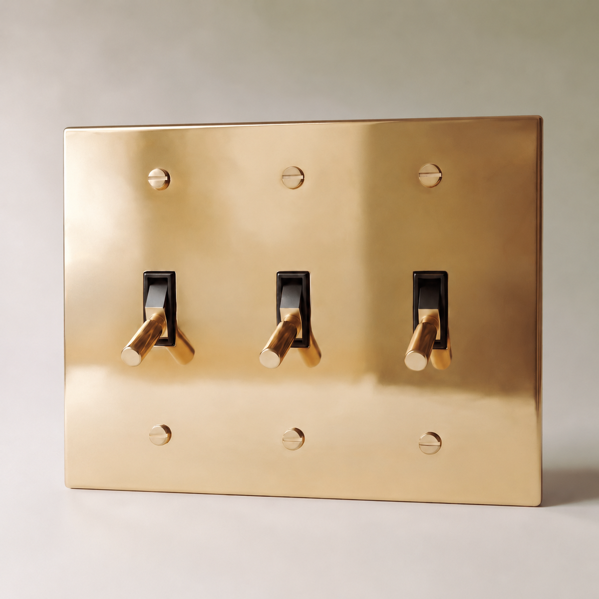 Polished Brass Toggle Switch, 3 Gang product view — seamless faceplate | CARRA HOME