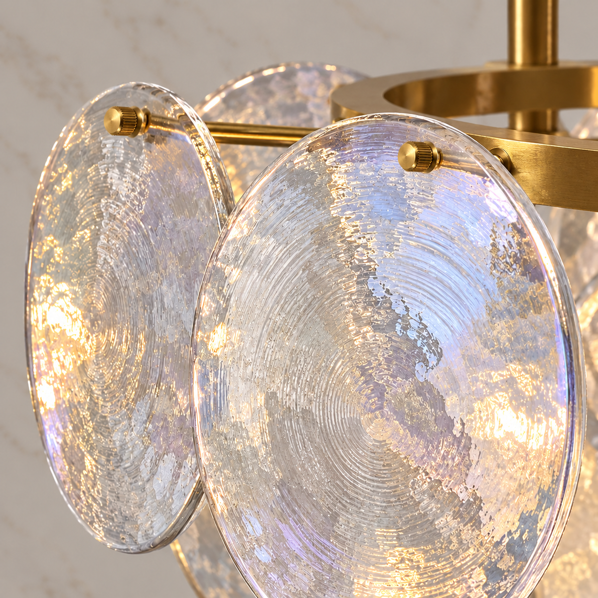 Roselle Iridescent Glass Disc Chandelier, concentric spun glass texture and small knurled brass fastener detail | CARRA HOME