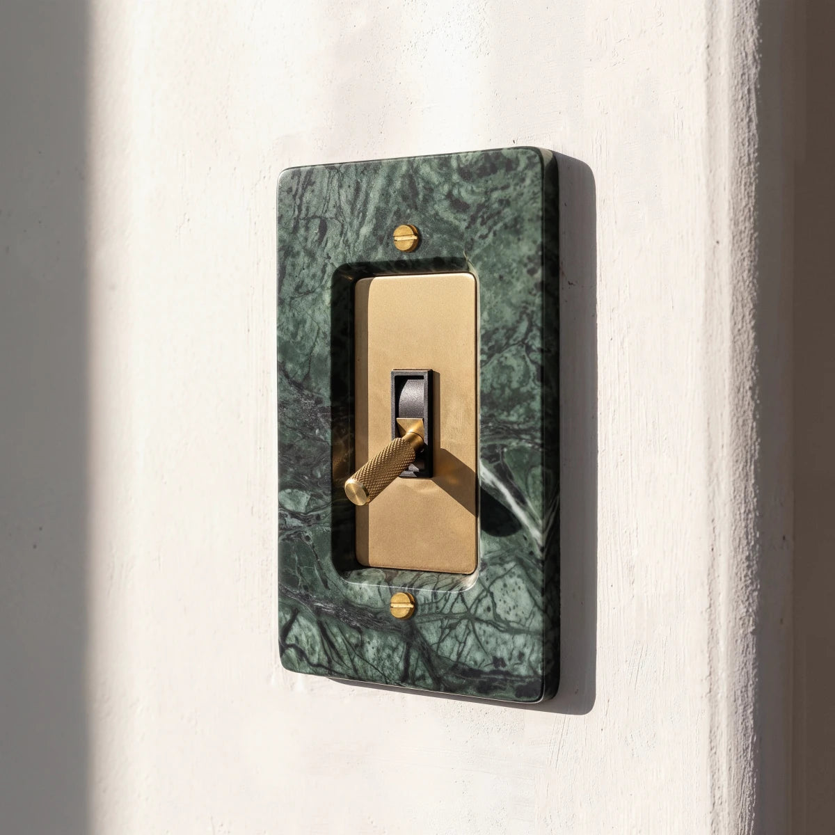 Stone Toggle Switch installed in an interior, view 19 | CARRA HOME