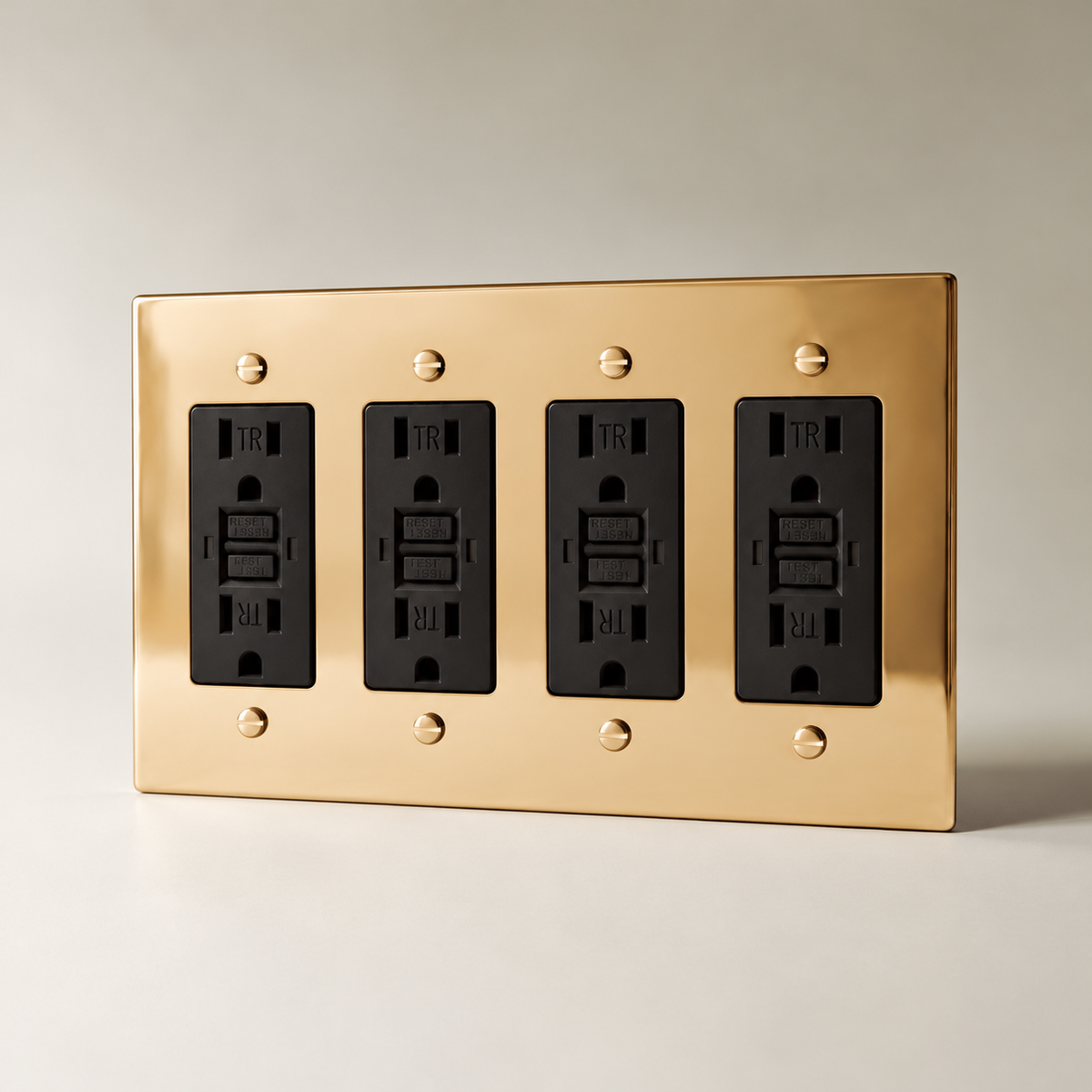 The Polished Brass Outlet — black GFCI outlets, 4 Gang | CARRA HOME