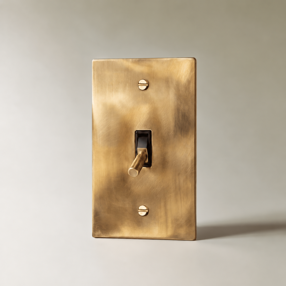 Unlacquered Brass Toggle Switch with seamless brass faceplate, 1 Gang product view | CARRA HOME