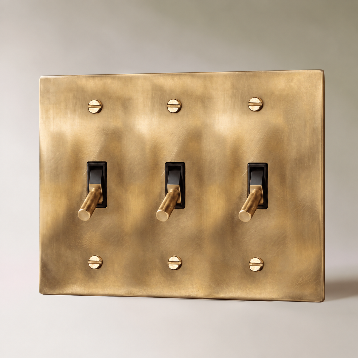 Unlacquered Brass Toggle Switch with seamless brass faceplate, 3 Gang product view | CARRA HOME