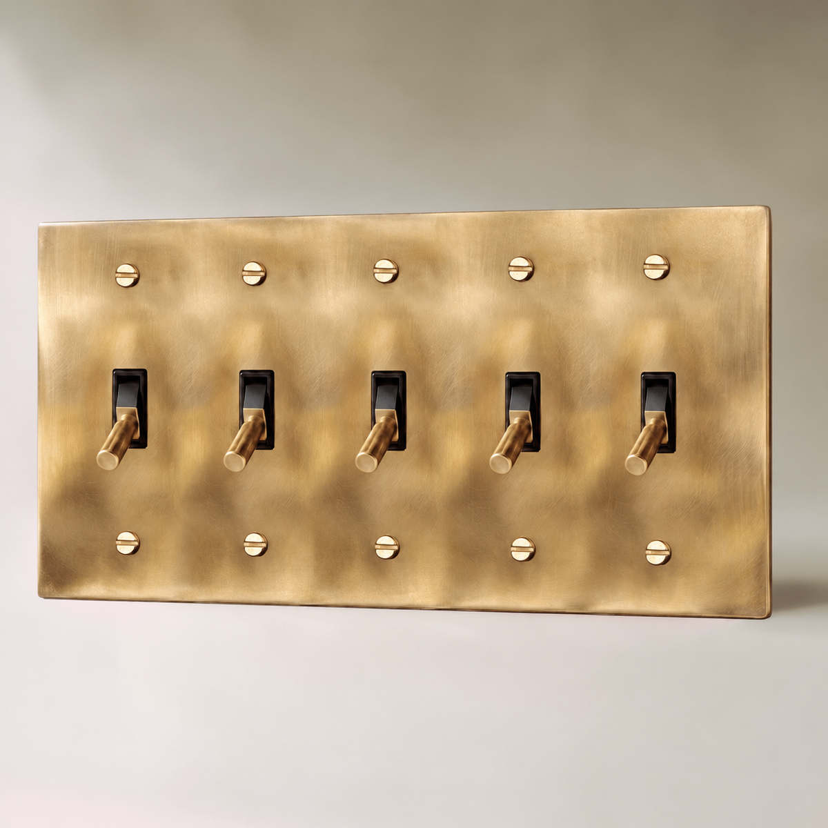 Unlacquered Brass Toggle Switch with seamless brass faceplate, 5 Gang product view | CARRA HOME