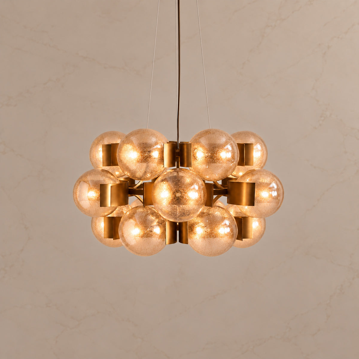 Allis seeded glass globe chandelier with lights on | CARRA HOME