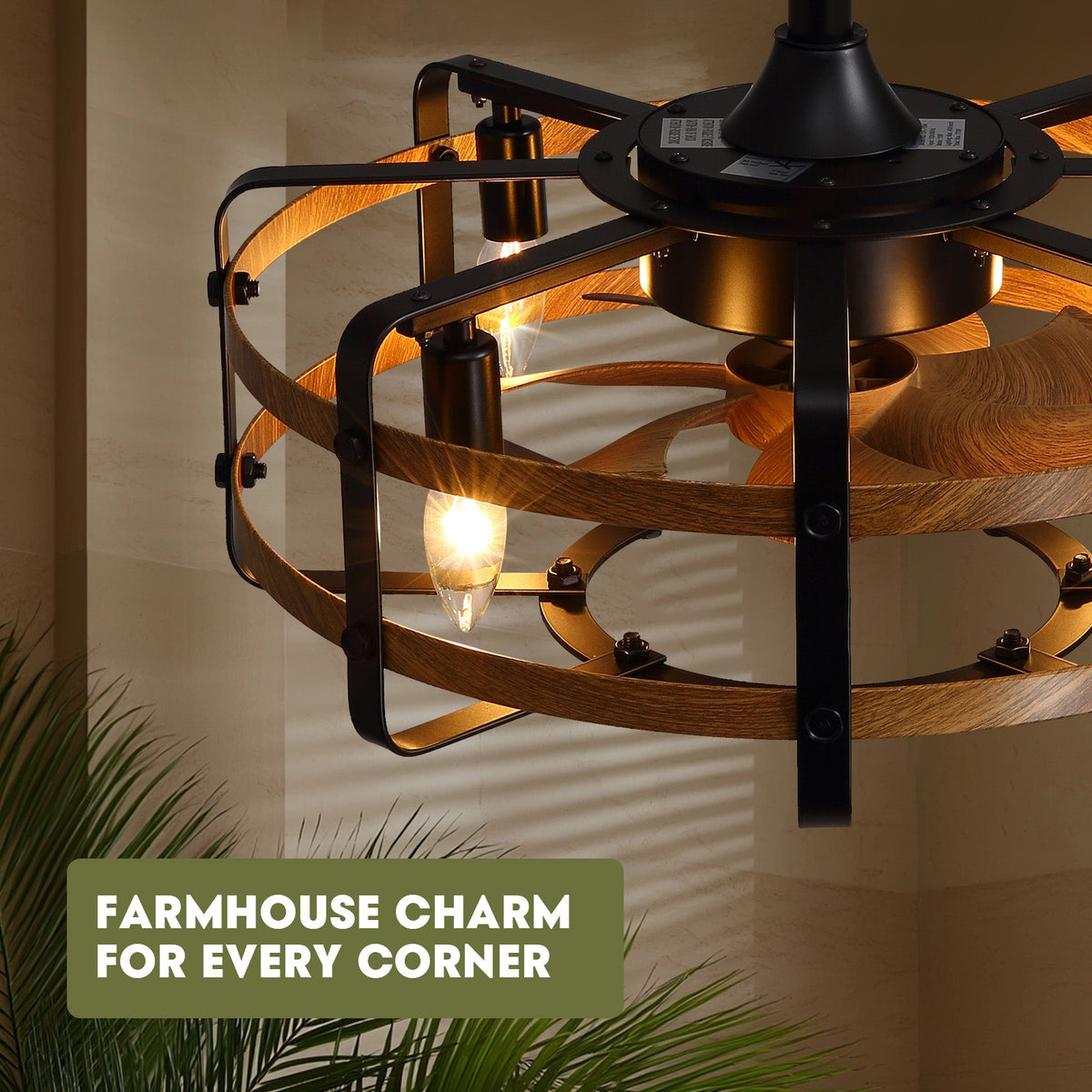 Close-up of farmhouse caged fan — matte black metal frame, wood grain rings, vintage E12 bulb glow, "Farmhouse Charm for Every Corner" text, palm leaf accent, warm interior | CARRA HOME