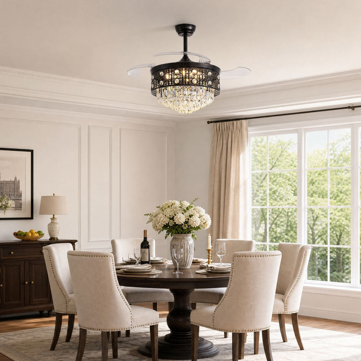 Black crystal retractable fan in elegant dining room — dark wood table, cream upholstered chairs, floral centerpiece, warm ambient lighting | CARRA HOME