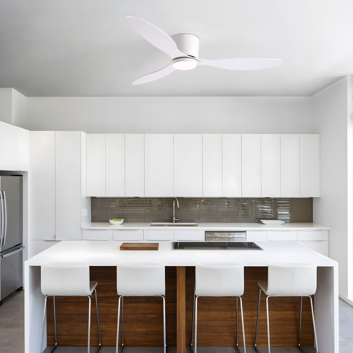 Aeroform Flush Mount Fan in modern white kitchen — marble countertop, bar stools, stainless steel fridge, provides efficient airflow over cooking area | CARRA HOME