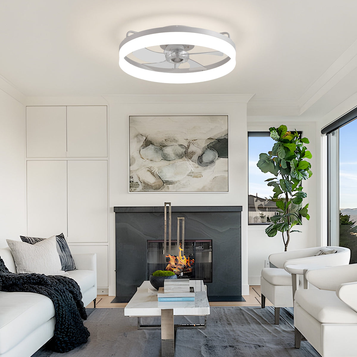 Aeros Caged Ceiling Fan in bright living room — white sofa, abstract wall art, marble fireplace, large windows, blends style with air circulation | CARRA HOME
