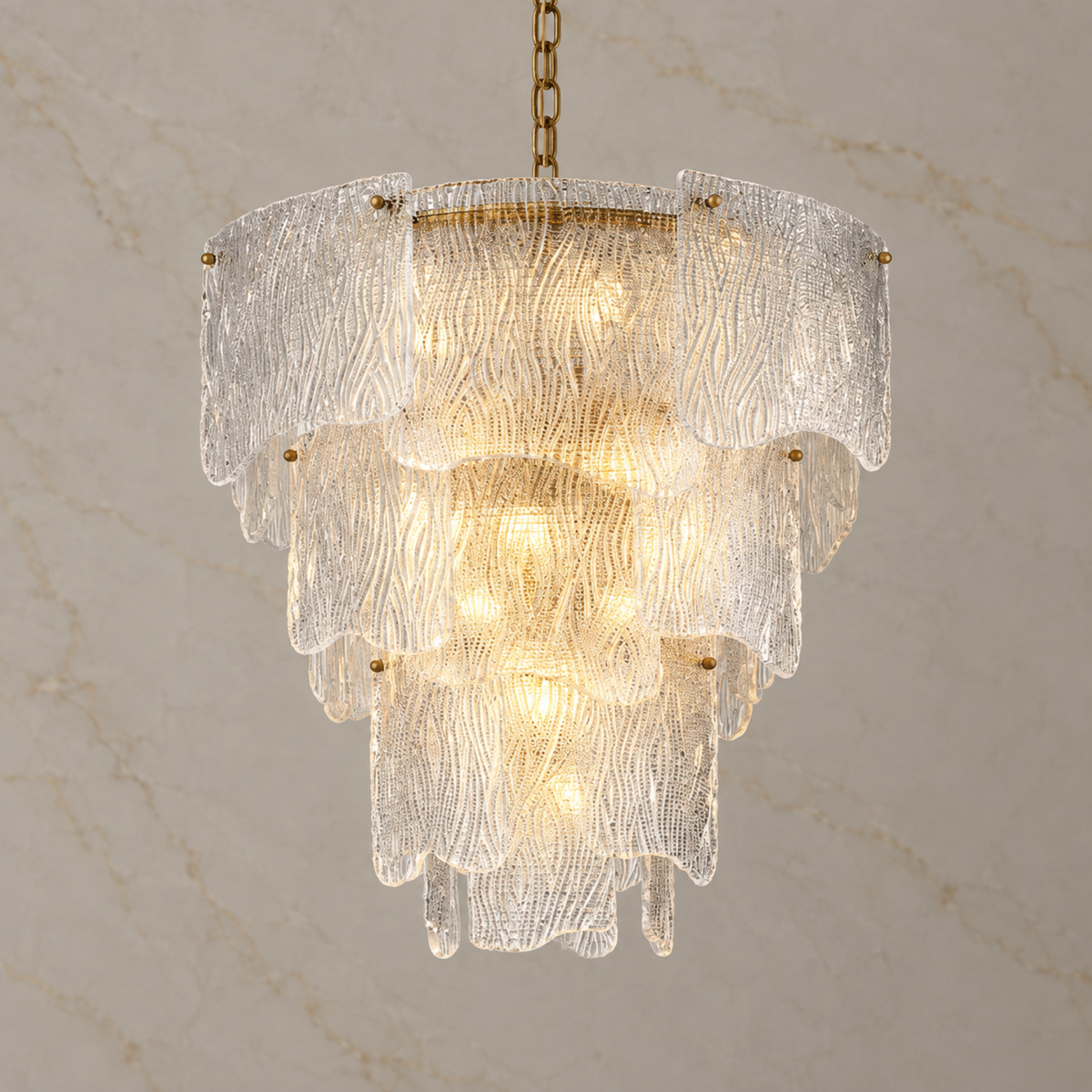Aurora large clear textured seeded glass chandelier illuminated | CARRA HOME