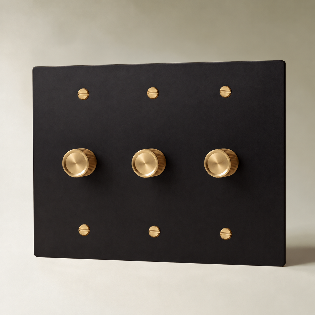 Brass Rotary Dimmer Switch, Night Black with Brass 3 Gang product view — seamless faceplate | CARRA HOME