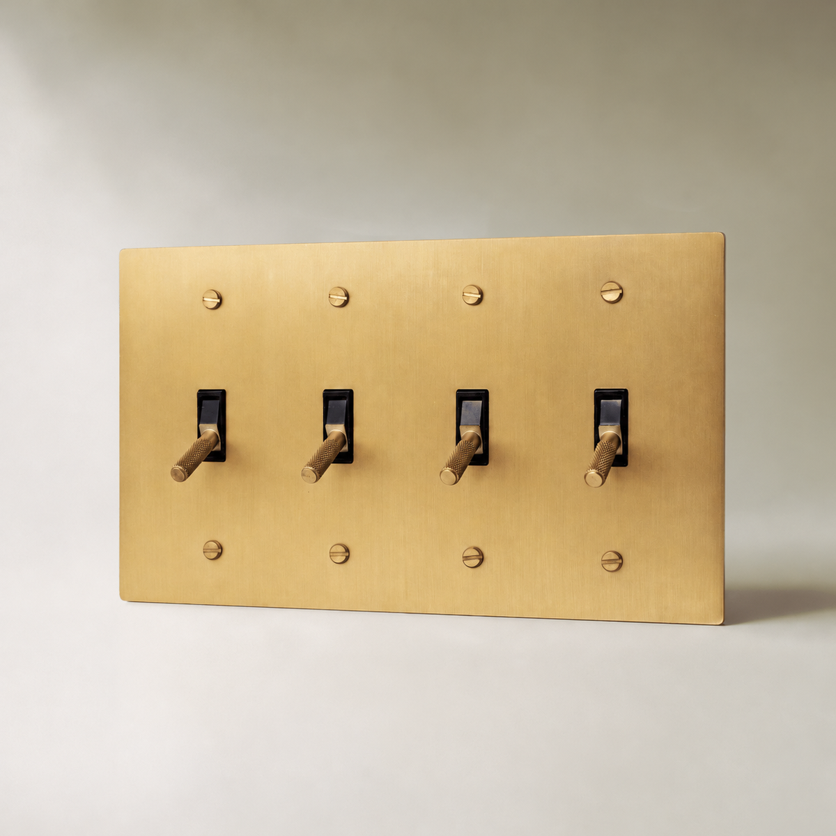 Brass Toggle Switch, Brass 4 Gang product view — seamless faceplate | CARRA HOME