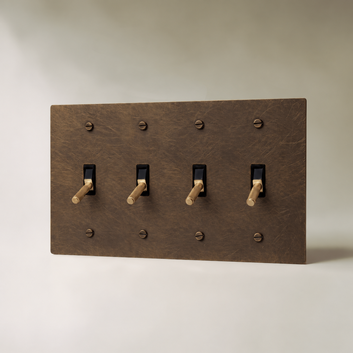 Brass Toggle Switch, Vintage Brass with Patina 4 Gang product view — seamless faceplate | CARRA HOME