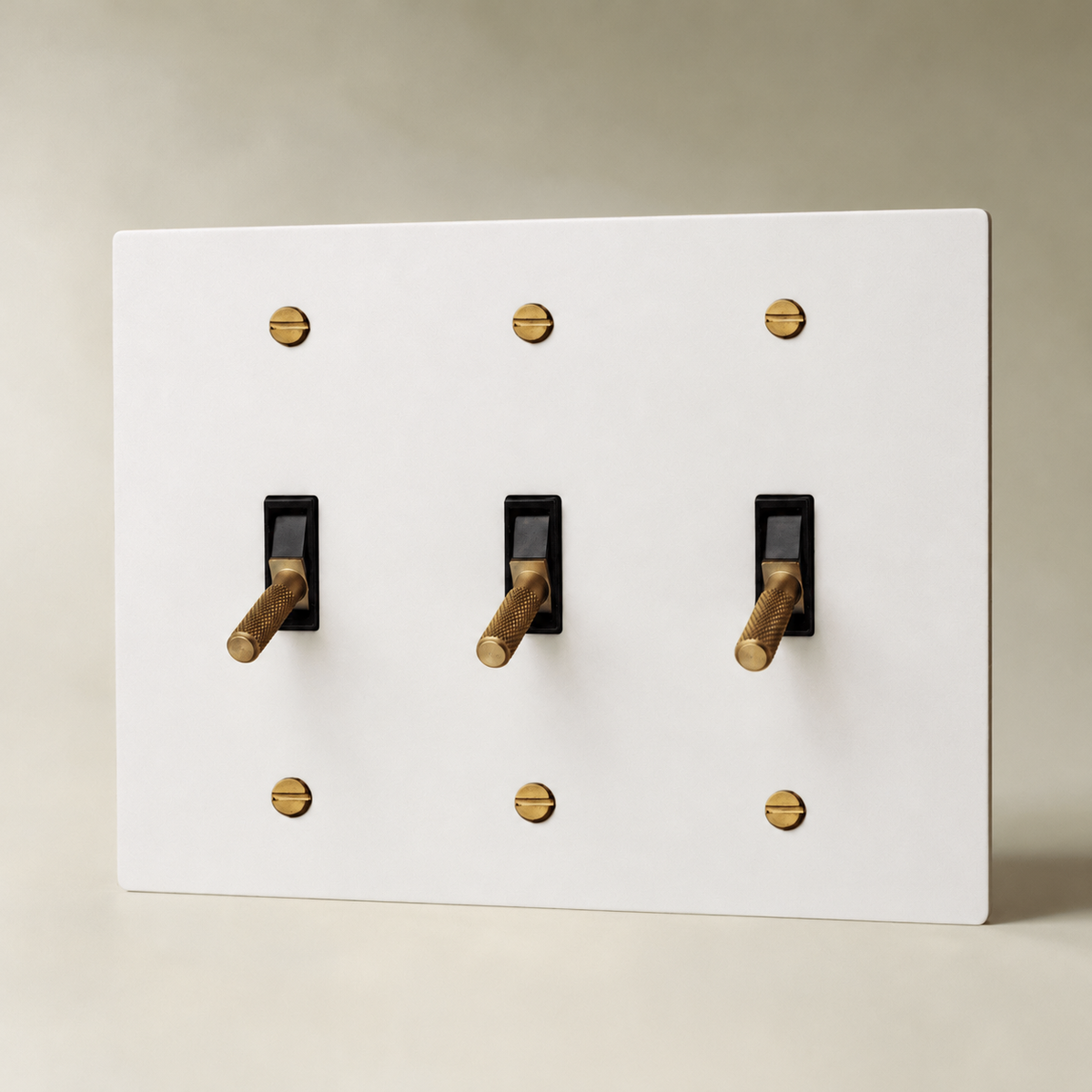 Brass Toggle Switch, White with Brass 3 Gang product view — seamless faceplate | CARRA HOME