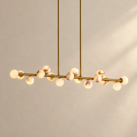 Orbelia alabaster globe linear chandelier silhouette.