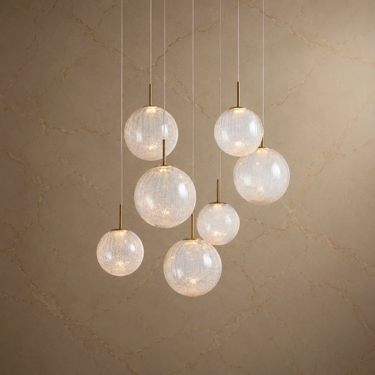 Casen 7-Light Sculptural Chandelier — seven textured glass globes, brass stems, adjustable height, ideal for medium-sized rooms and stairwells | Carra Home