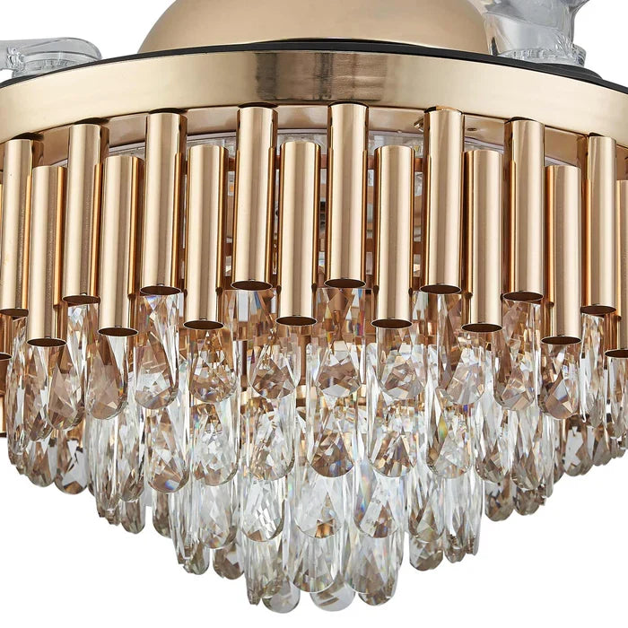 Close-up detail of Crownelle Luxury K9 Crystal Retractable Ceiling Fan Chandelier — featuring polished gold cylindrical frames and dangling clear crystal prisms, highlighting the premium craftsmanship