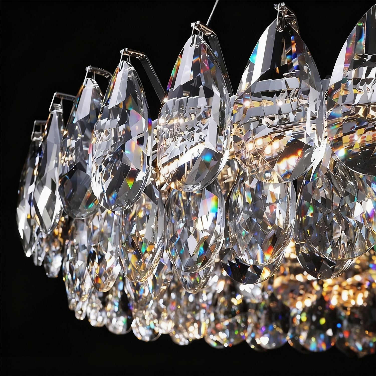 Extreme close-up of dual-tier crystal structure — cascading water drop prisms, layered design, and premium K9 crystal clarity for luxury illumination  | Carra Home