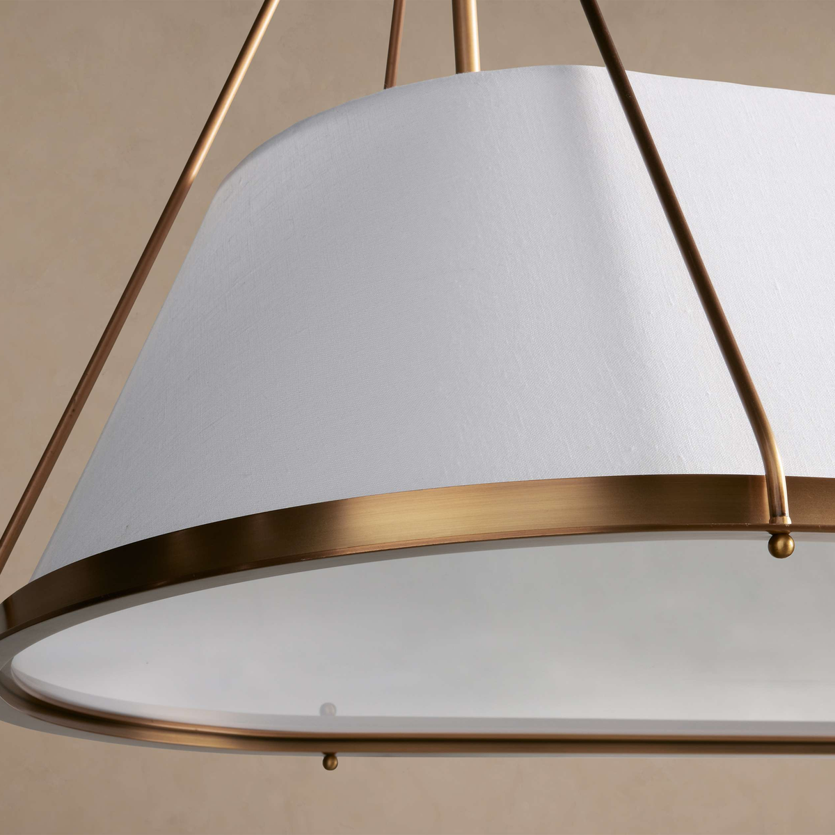 Ellery Linen Tapered Linear Chandelier woven linen shade, brass rim and diffuser detail | CARRA HOME